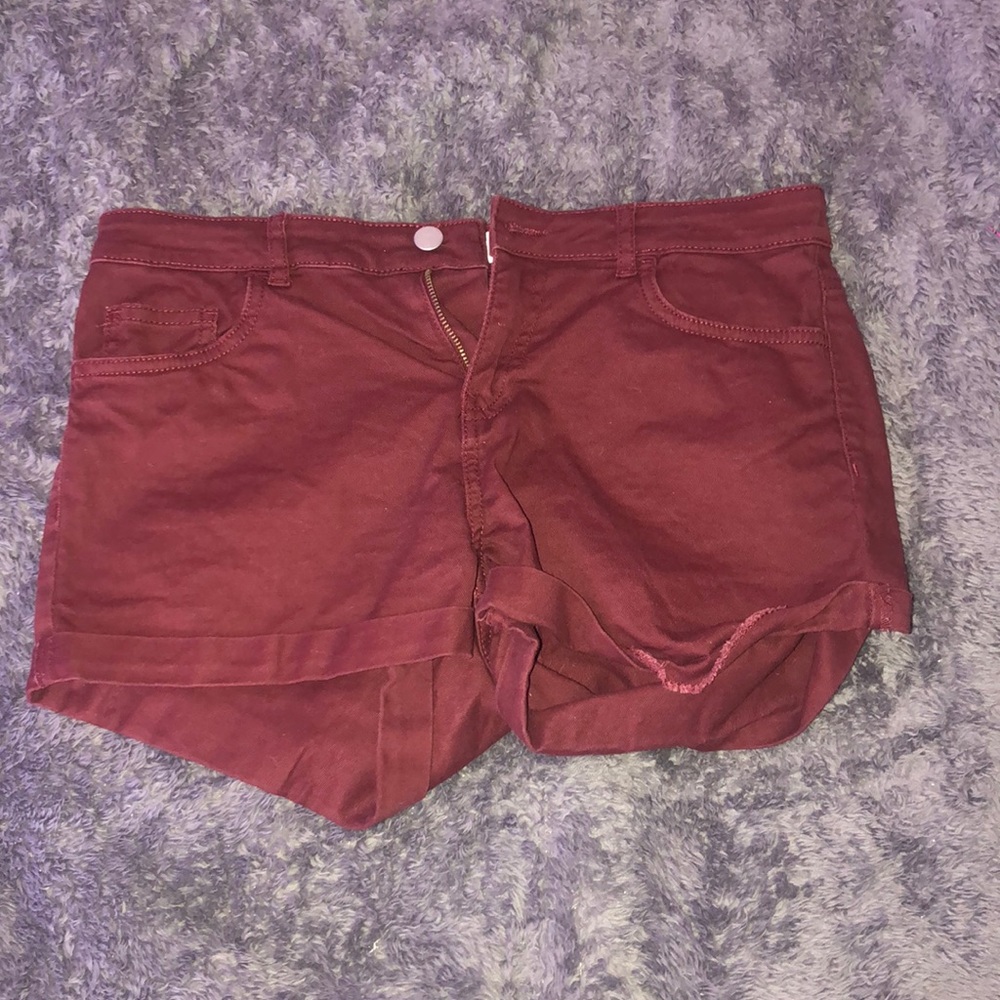 lightly worn red shorts